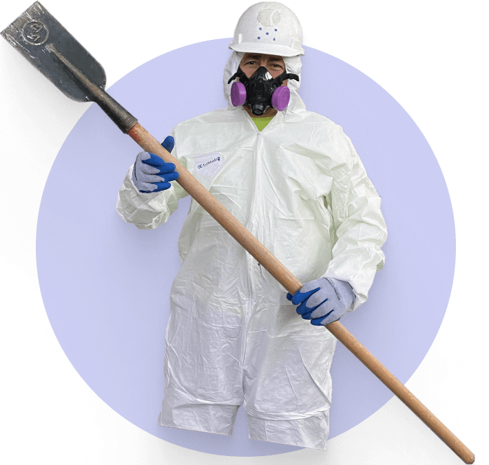 Keys Environmental Services asbestos contractor holding abatement tool